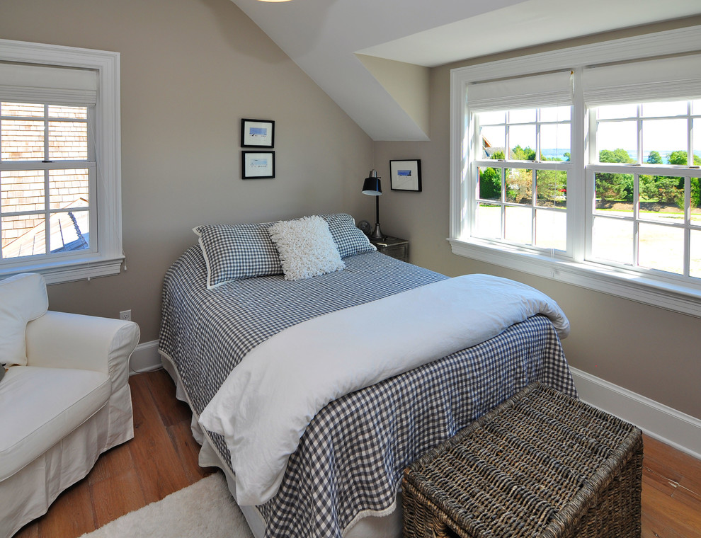 Country bedroom photo in Providence with beige walls