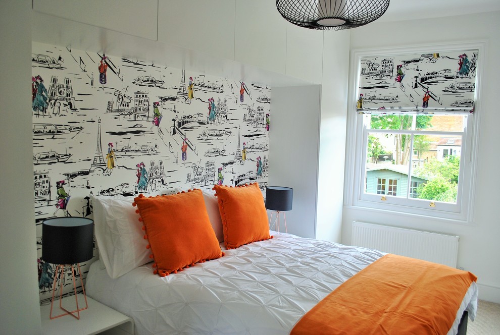 Inspiration for a small contemporary guest bedroom remodel in Hertfordshire with white walls