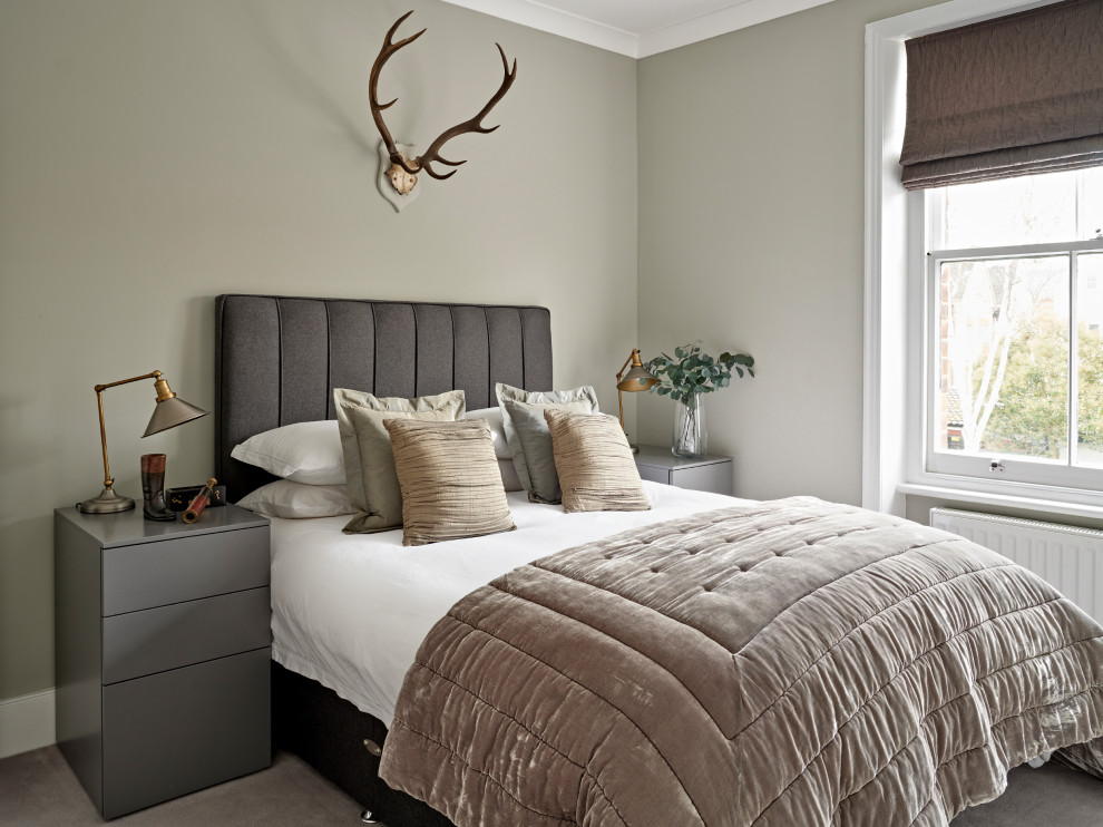 Inspiration for a mid-sized contemporary guest carpeted and gray floor bedroom remodel in London with gray walls