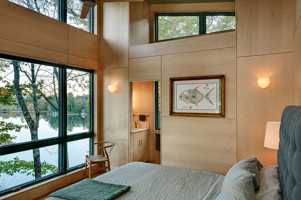 Diseño de habitación de invitados actual con paredes beige