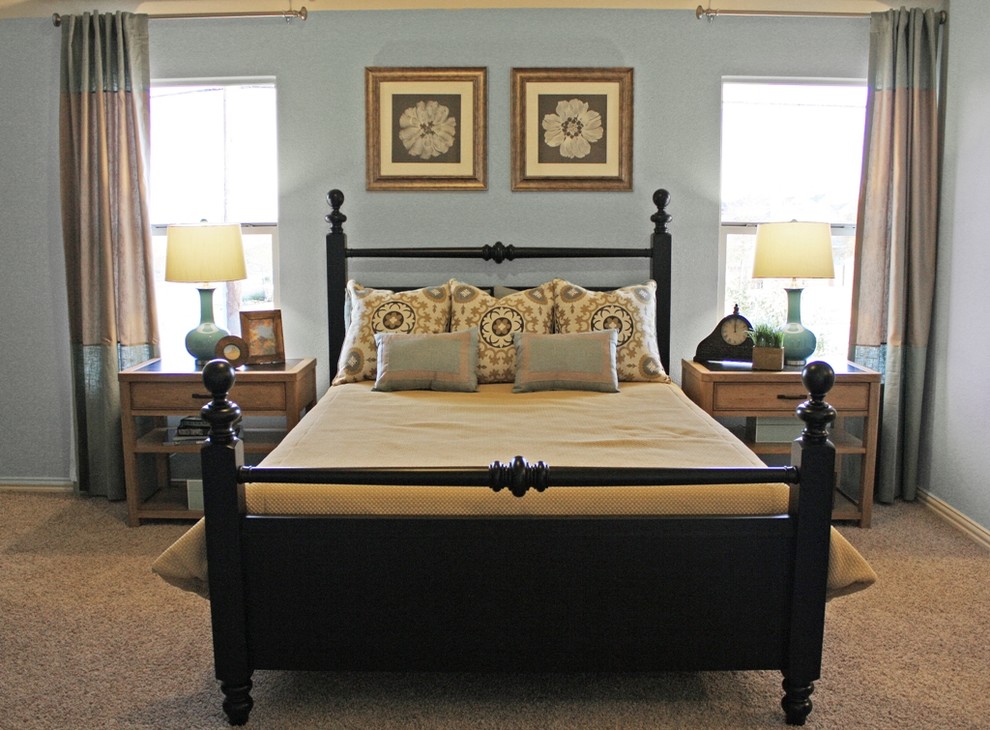 Inspiration for a timeless bedroom remodel in Dallas with blue walls