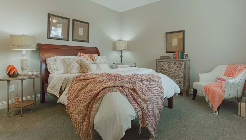 This is an example of a traditional grey and pink bedroom in Dallas.