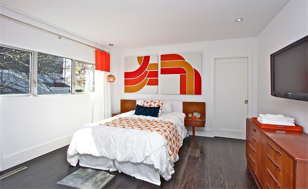 Photo of a medium sized retro guest bedroom in San Francisco with white walls and dark hardwood flooring.