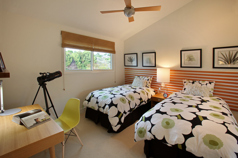 Small modern guest bedroom in Orange County with white walls, carpet and beige floors.