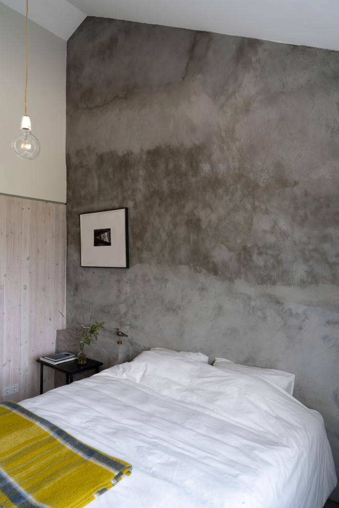 Inspiration för mellanstora nordiska gästrum, med grå väggar, betonggolv och grått golv