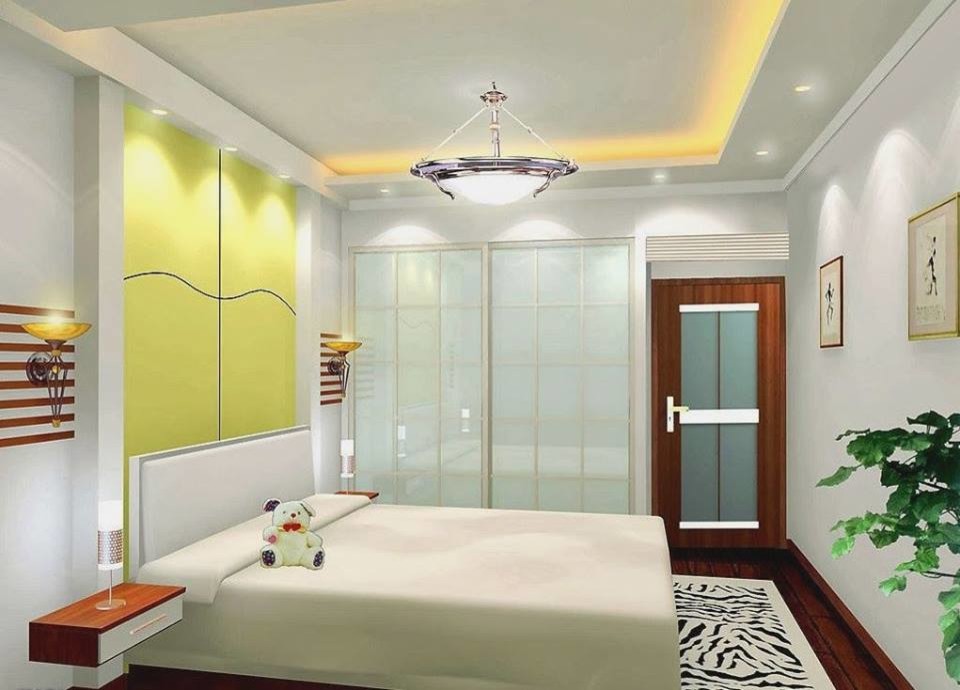 Ejemplo de dormitorio principal minimalista de tamaño medio con suelo de madera clara y paredes grises