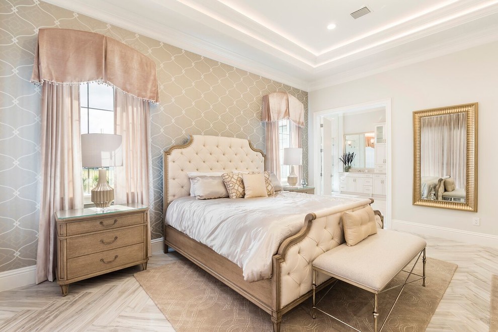Design ideas for a mediterranean master bedroom in Orlando with multi-coloured walls, grey floors and a feature wall.
