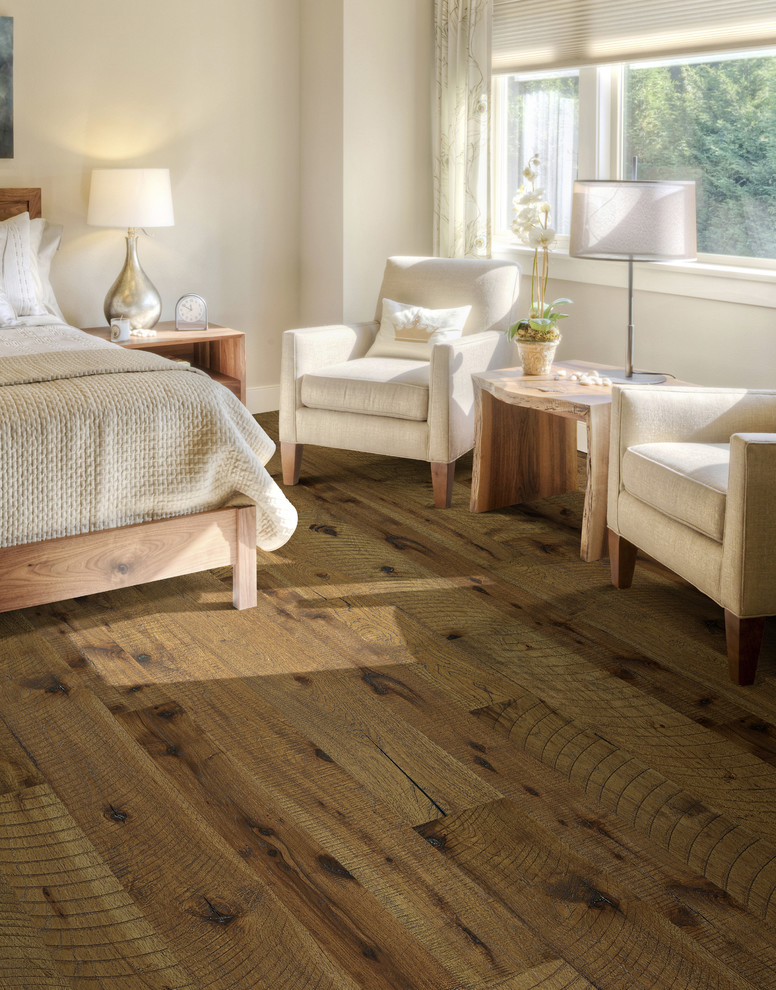 Inspiration for a mid-sized modern master medium tone wood floor bedroom remodel in St Louis with white walls