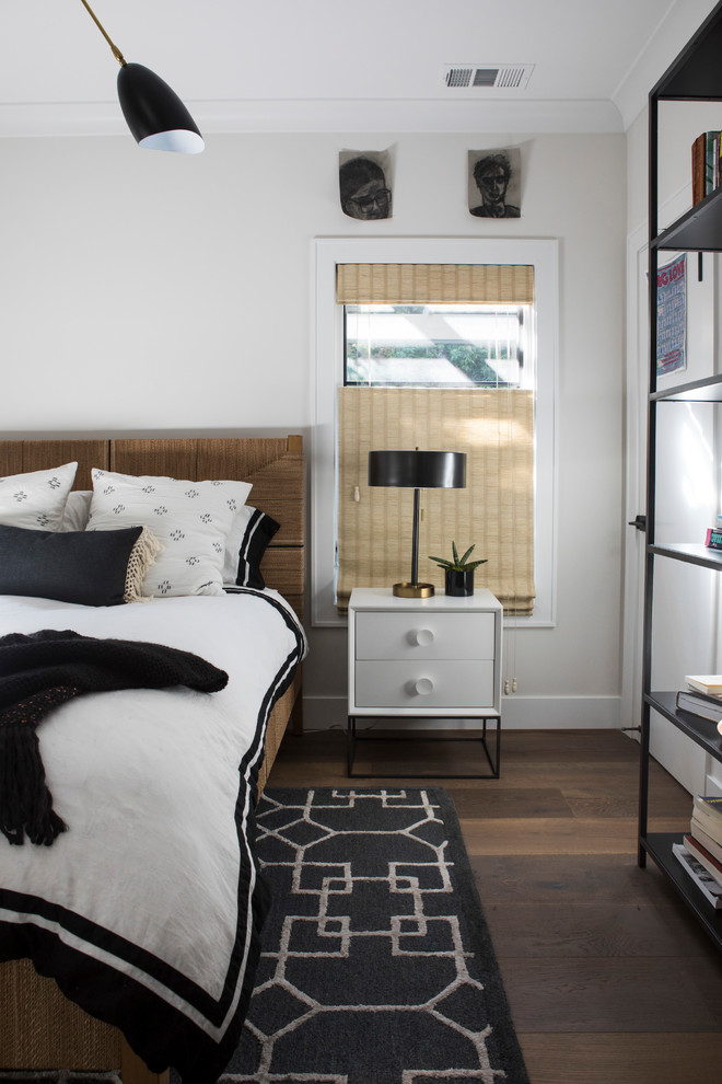 Medium sized bohemian guest bedroom in San Francisco with white walls and medium hardwood flooring.