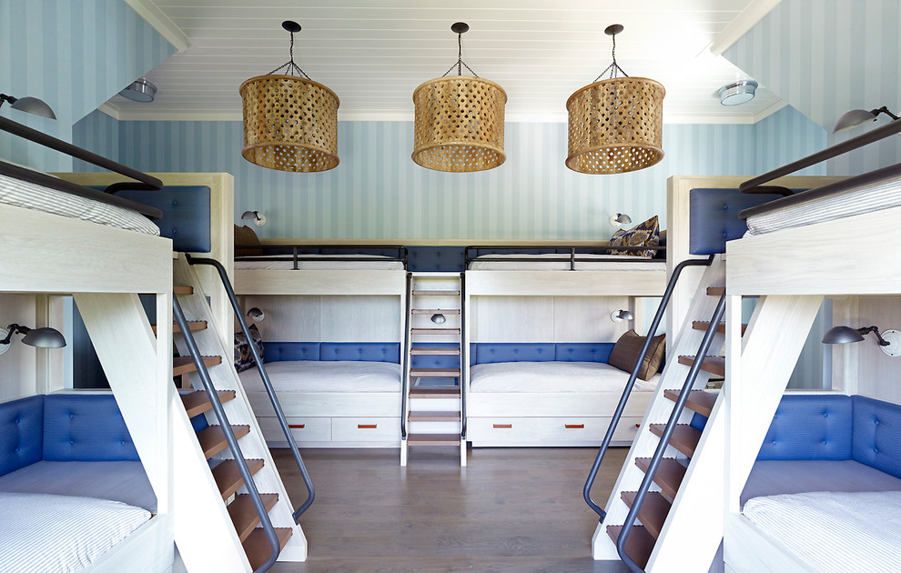 Example of a trendy bedroom design in New York with blue walls