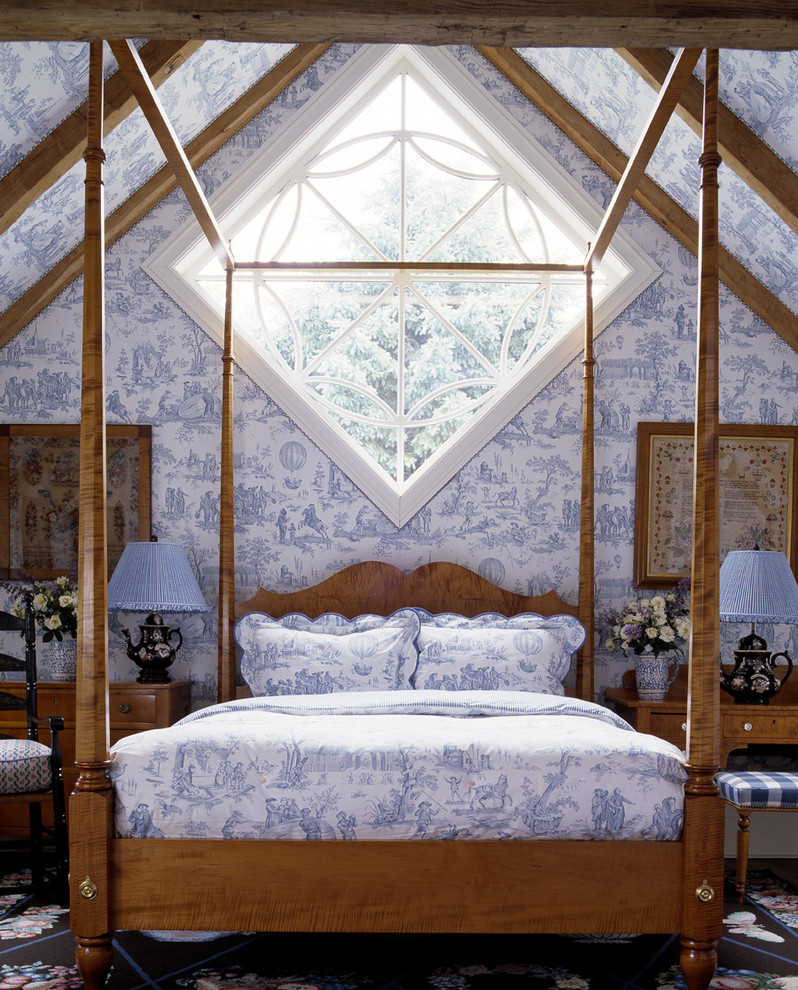 Elegant bedroom photo in New York with blue walls