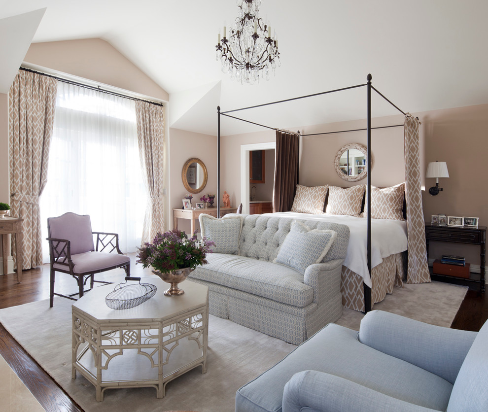 Elegant bedroom photo in New York with beige walls