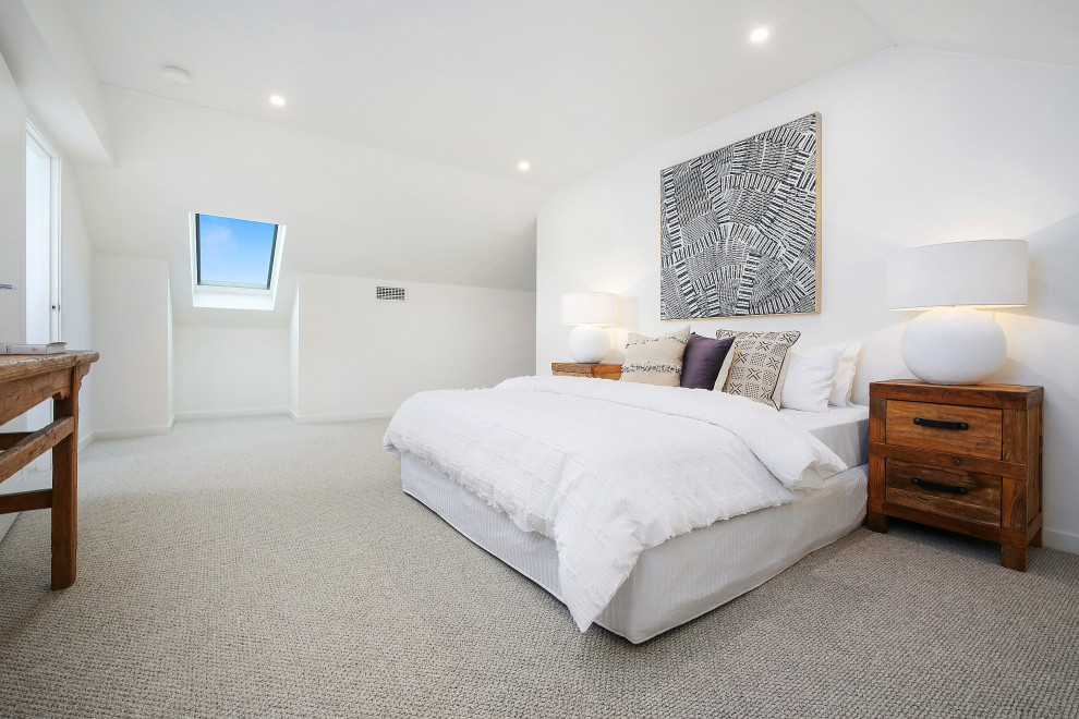 This is an example of a coastal bedroom in Central Coast.