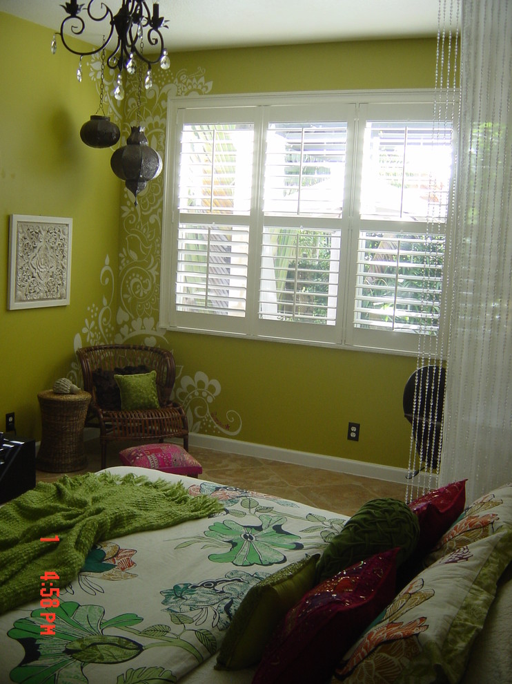 This is an example of an eclectic bedroom in Miami.
