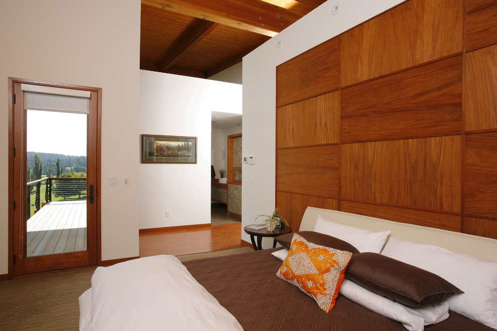 Imagen de dormitorio moderno con paredes blancas