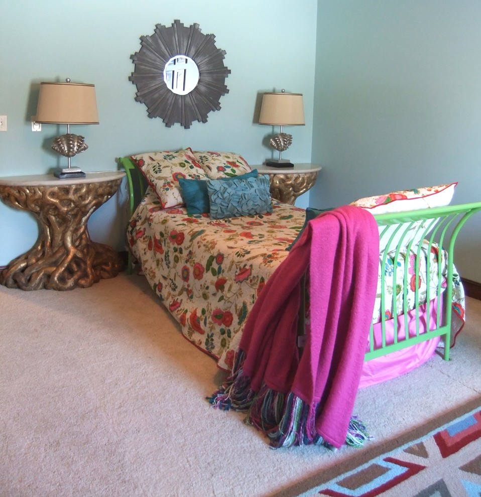 Example of an eclectic carpeted bedroom design in Minneapolis with blue walls