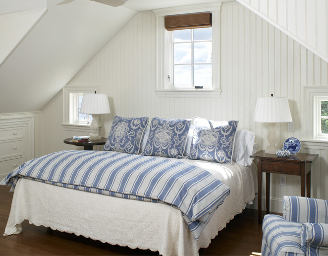 Bedroom - mid-sized coastal medium tone wood floor bedroom idea in Boston with white walls