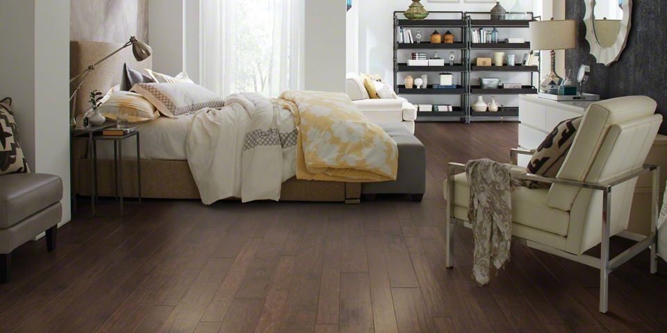 Inspiration for a large contemporary master bedroom in Other with white walls and dark hardwood flooring.
