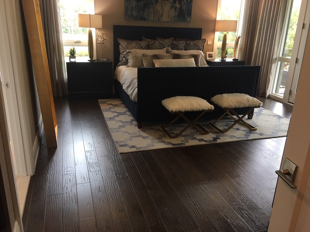 Inspiration for a contemporary master bedroom in Detroit with beige walls, dark hardwood flooring, no fireplace and brown floors.