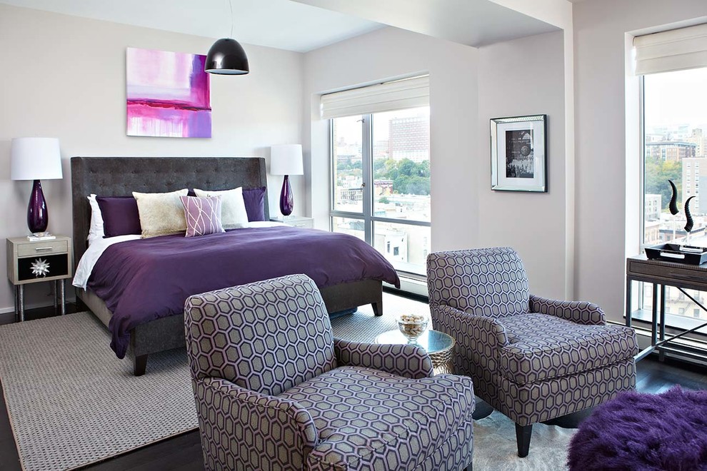 Inspiration for a contemporary grey and purple bedroom in New York with grey walls and dark hardwood flooring.