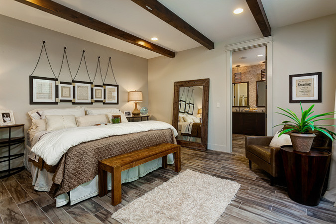 Inspiration for a rustic master bedroom in Boise.
