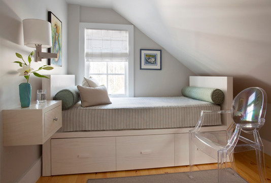 Example of a minimalist bedroom design in Boston