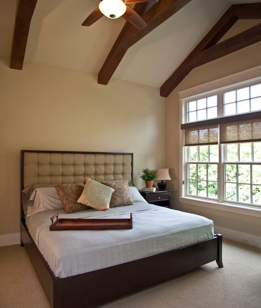 Bedroom - large traditional master carpeted bedroom idea in Grand Rapids with beige walls