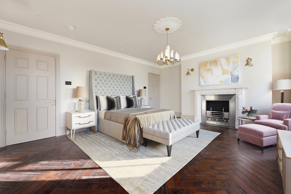 Inspiration pour une chambre parentale design avec un mur beige, parquet foncé, une cheminée standard et un manteau de cheminée en métal.
