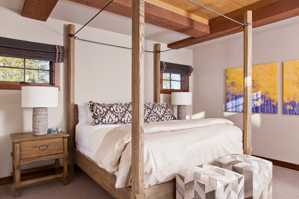 Photo of a medium sized rustic master bedroom in Other with white walls, carpet and beige floors.