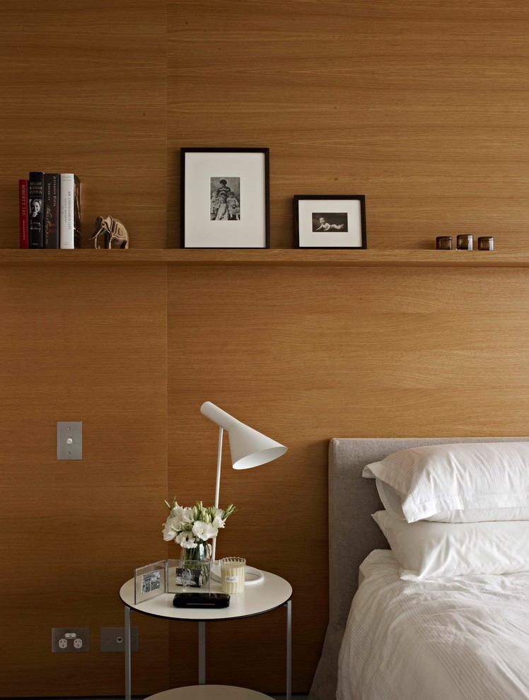 Photo of a contemporary bedroom in Melbourne with brown walls.