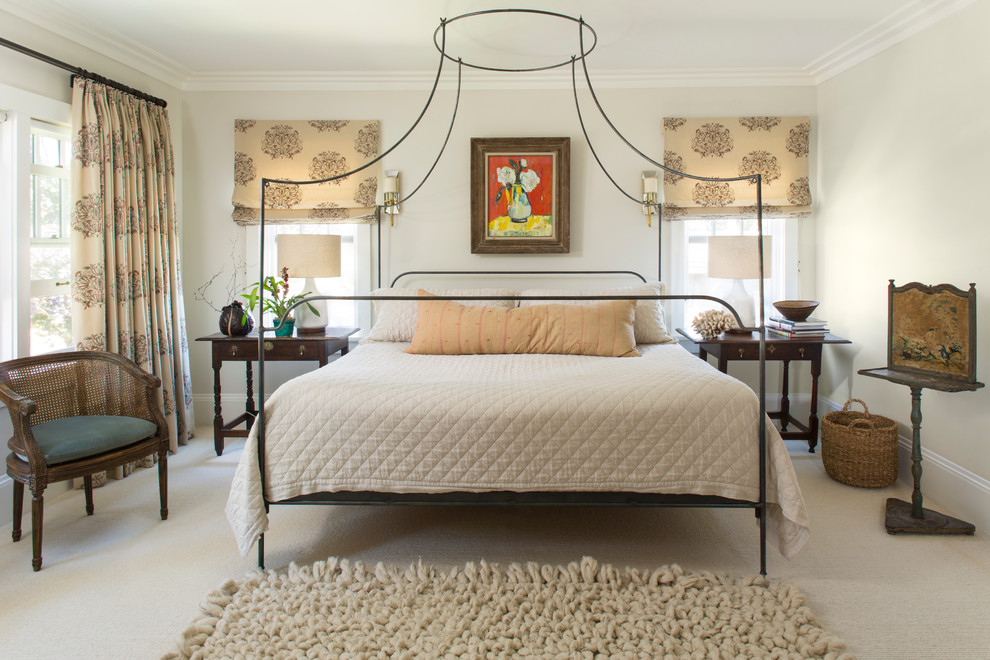 This is an example of a traditional master bedroom in Minneapolis with grey walls and carpet.