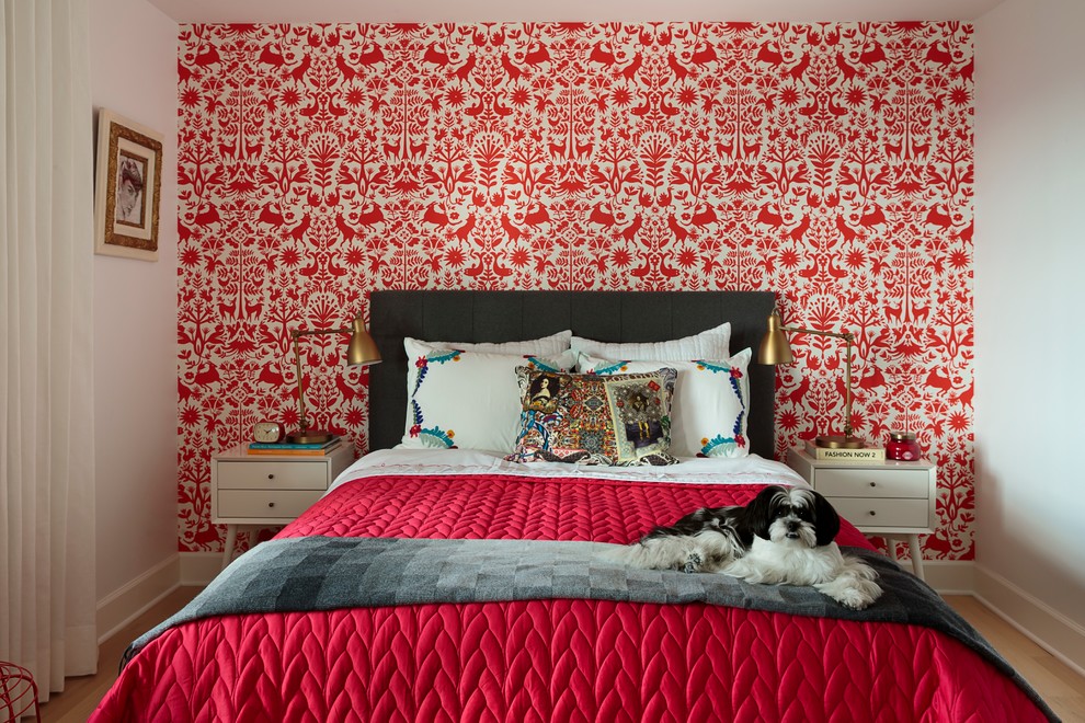 Inspiration for a mid-sized contemporary light wood floor bedroom remodel in Los Angeles with red walls