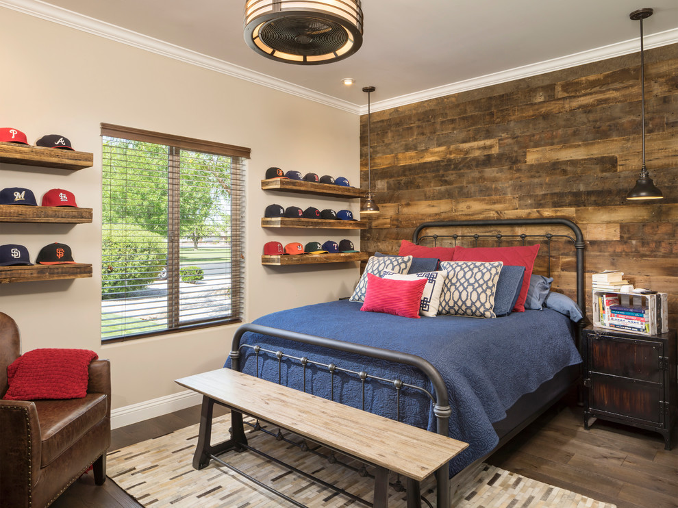 Photo of a medium sized industrial bedroom in Phoenix with beige walls, medium hardwood flooring and brown floors.