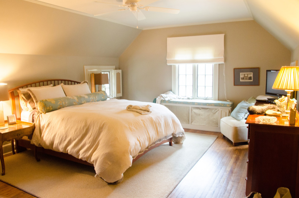 Inspiration for an eclectic master medium tone wood floor bedroom remodel in Other with gray walls