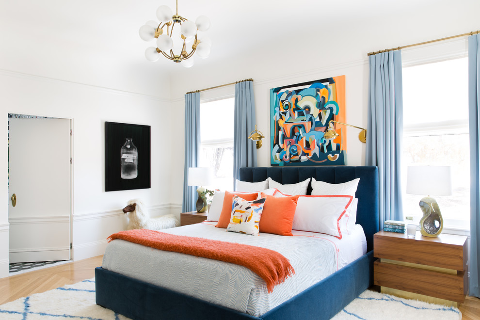 Inspiration for a classic master bedroom in San Francisco with white walls and medium hardwood flooring.