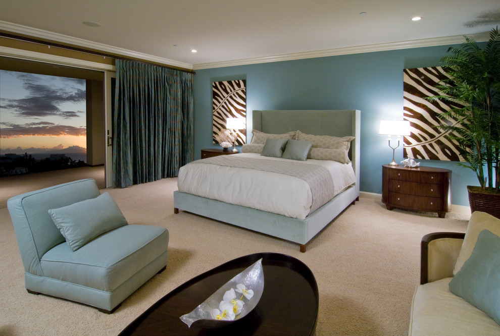 Island style master carpeted bedroom photo in Hawaii with blue walls