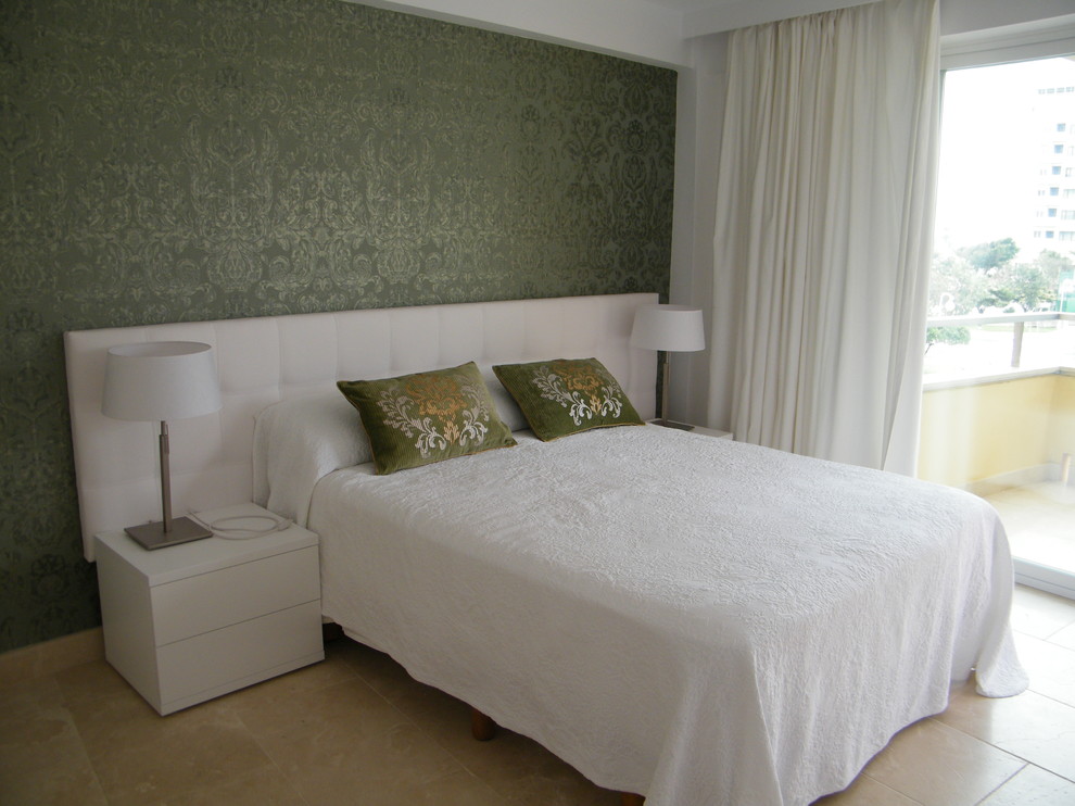 Medium sized beach style master bedroom in Dublin with beige walls.
