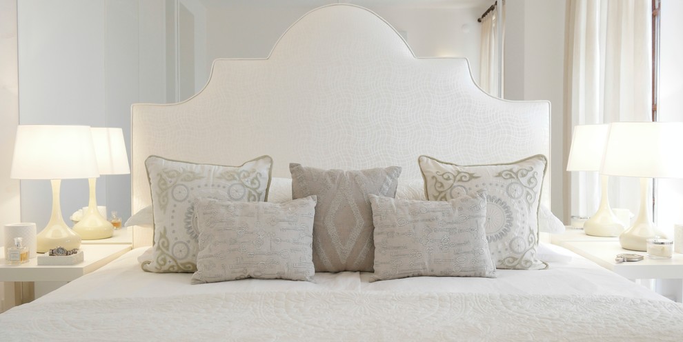 Example of a mid-sized trendy guest carpeted bedroom design in Other with white walls