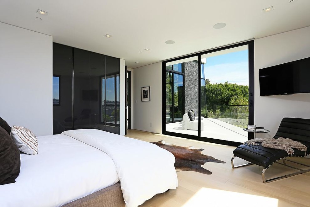 Inspiration for a huge contemporary master light wood floor and beige floor bedroom remodel in Los Angeles with white walls and no fireplace