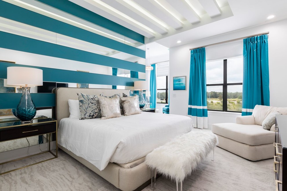 Immagine di una camera da letto design con pareti bianche, moquette e pavimento grigio