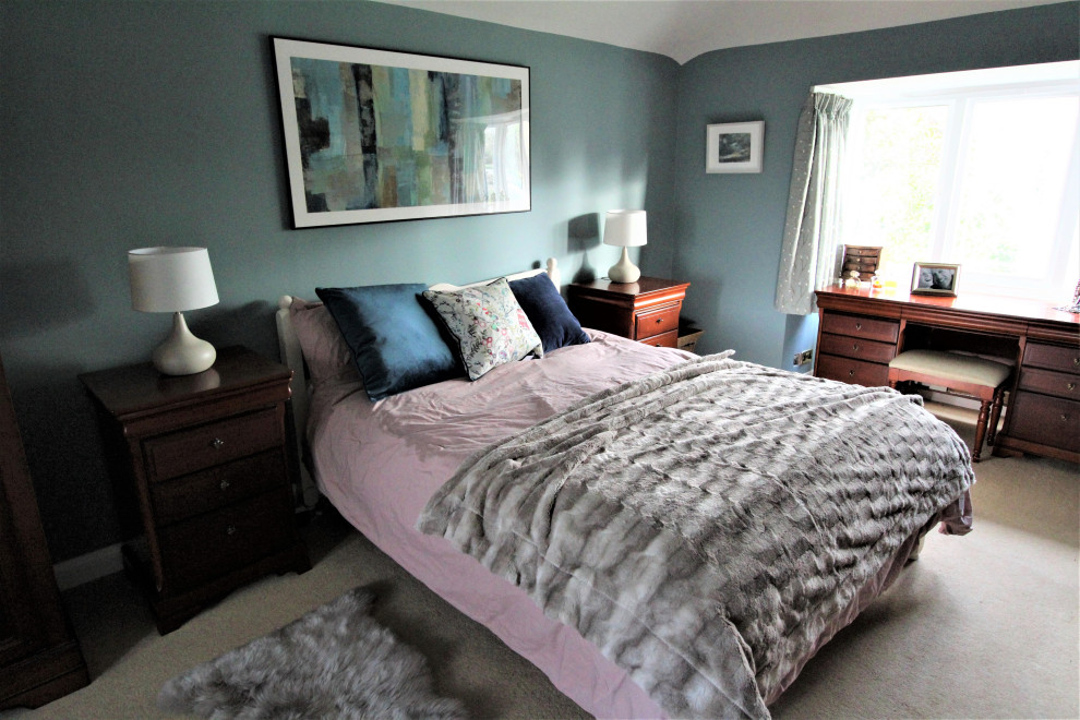 Inspiration for a large traditional guest and grey and pink bedroom in Cambridgeshire with blue walls.