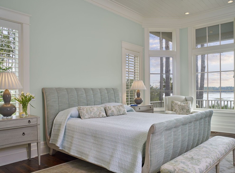Inspiration for a mid-sized timeless master medium tone wood floor bedroom remodel in Atlanta with blue walls and no fireplace