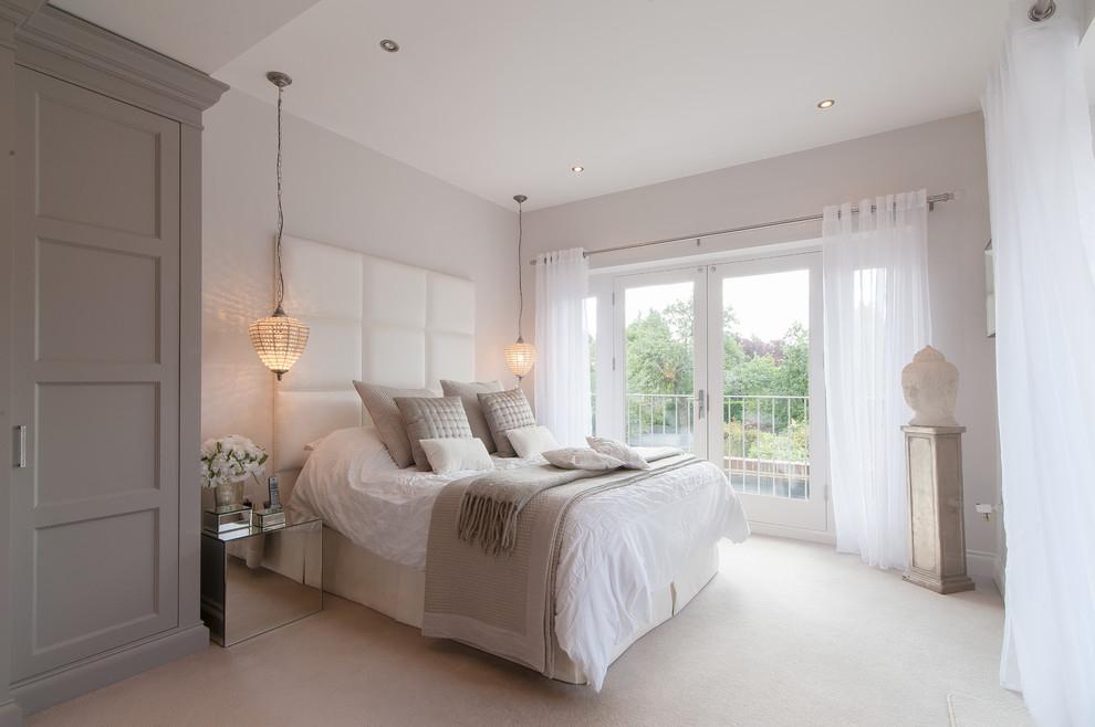 Photo of a classic grey and cream bedroom in Surrey.