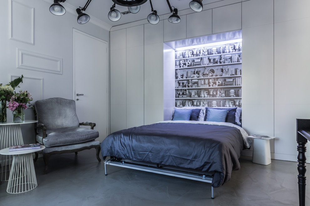 Kleines Eklektisches Gästezimmer ohne Kamin mit grauer Wandfarbe und Betonboden in Sonstige