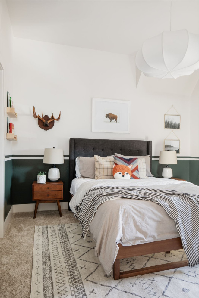 Inspiration for a mid-sized transitional guest carpeted and beige floor bedroom remodel in Oklahoma City with white walls