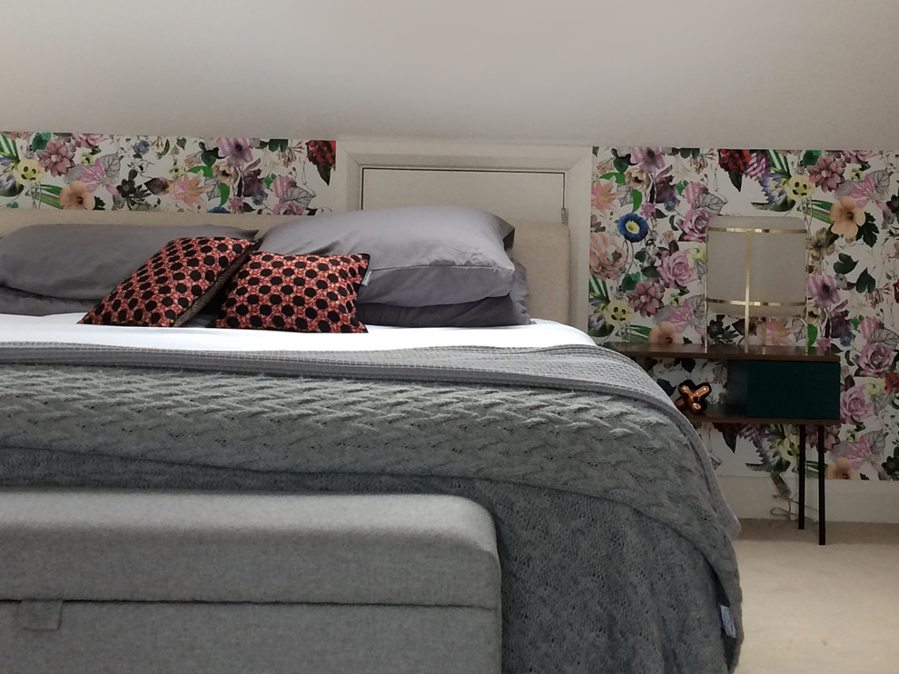 Contemporary grey and cream bedroom in London.