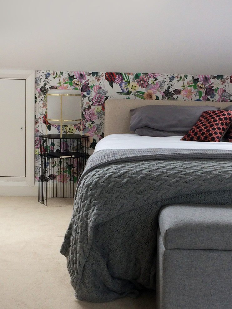 This is an example of a contemporary grey and cream bedroom in London.