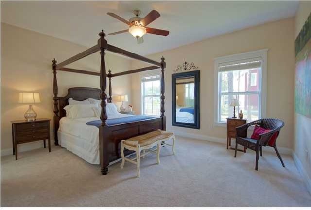 This is an example of a world-inspired bedroom in Charleston.