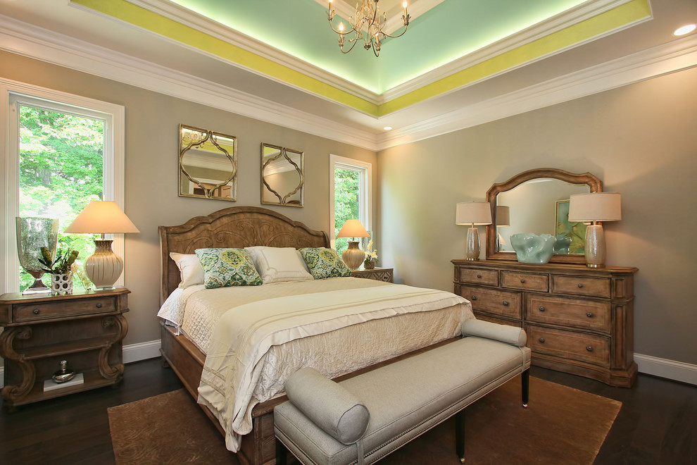 Example of a mid-sized mountain style master medium tone wood floor bedroom design in Louisville with gray walls and no fireplace