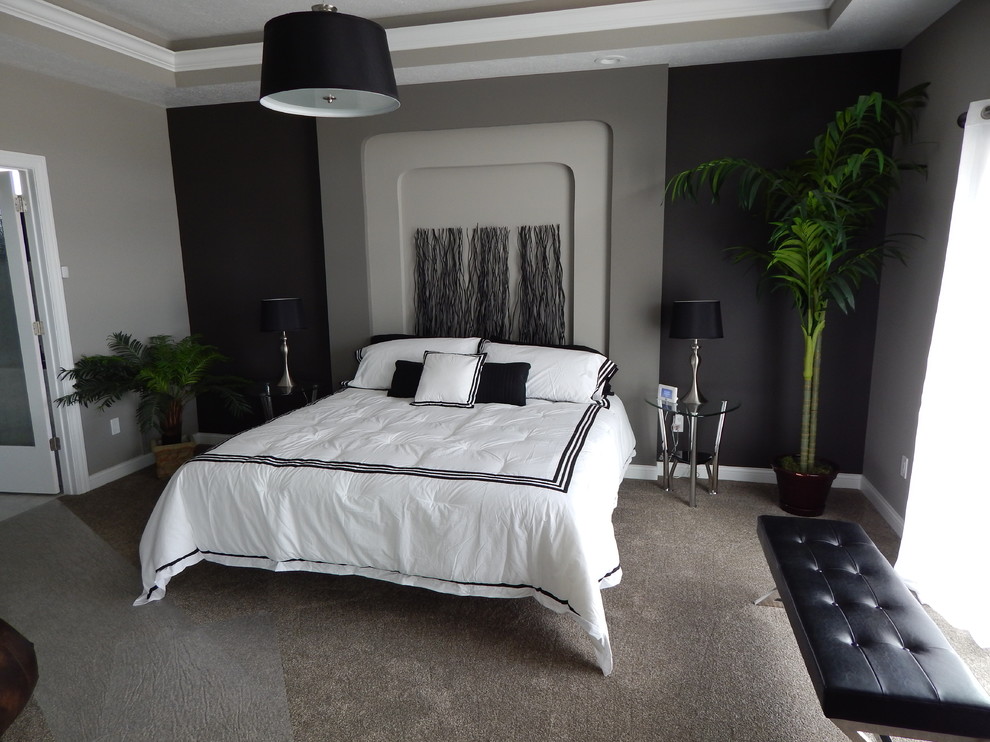 This is an example of a medium sized contemporary master bedroom in Other with black walls, carpet, no fireplace and grey floors.